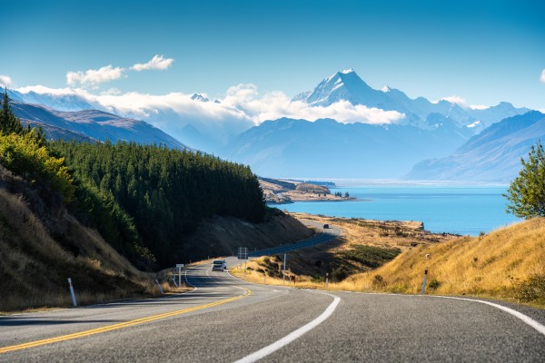 Photo of rural road with Aoraki/Mt Cook in Background